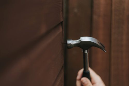 Hammer hitting nail